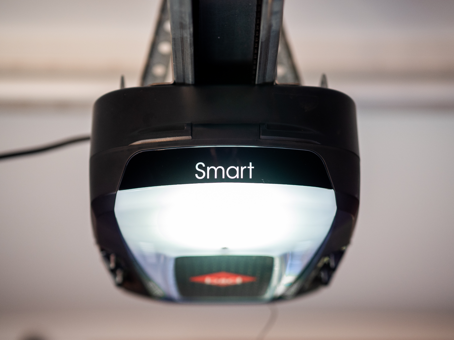 B&D Controll-A-Door Smart sectional garage door opener mounted to a garage ceiling
