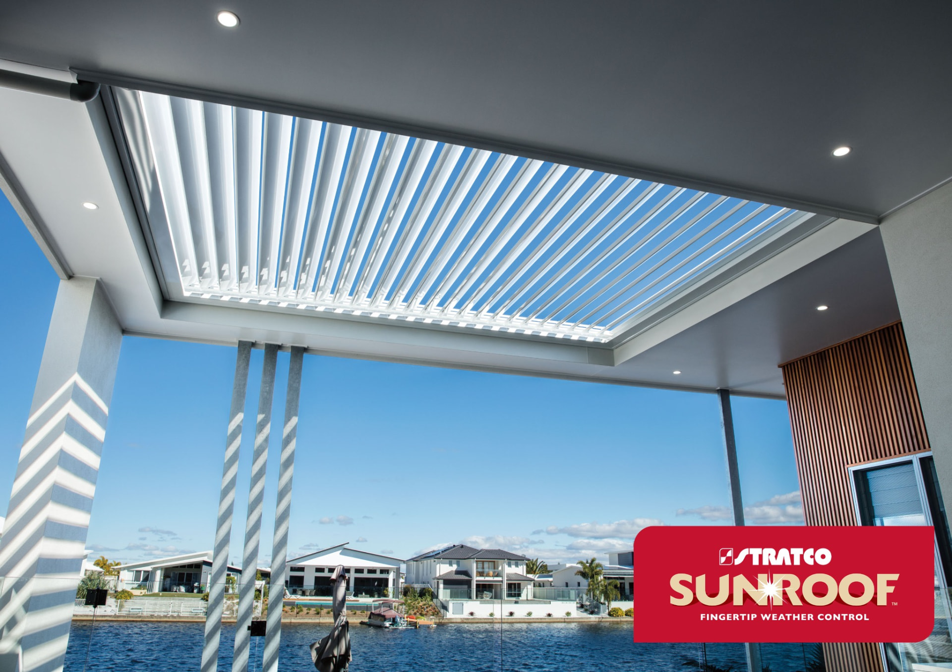 Stratco Sunroof opening louvre roof set into an outdoor living ceiling — Stratco product imagery